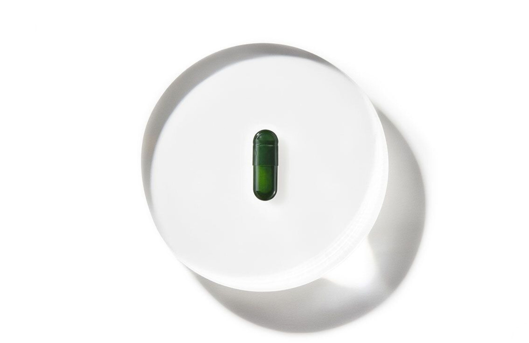 Med-Lock ds-01 capsule on top of magnified glass