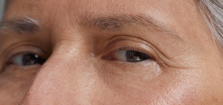 closeup of older persons eyes looking at camera
