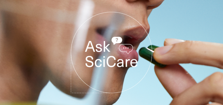 Person holding a green capsule near their mouth against a blue background with text overlay.